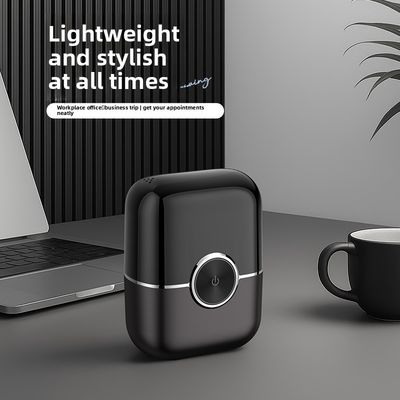 Mini rasoir électrique portable pour hommes avec système flottant magnétique à 4 lames et 100 minutes de temps de travail alimenté par une batterie de 300 mAh