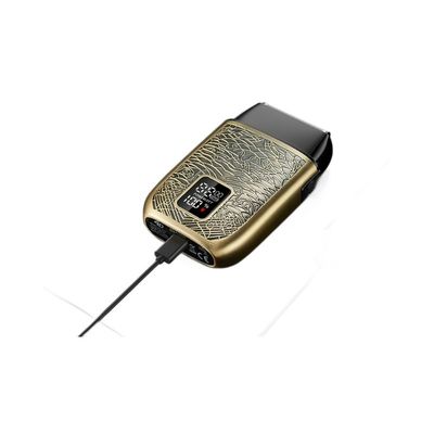 Un rasoir électrique professionnel pour homme avec une batterie de 500 mAh, des lames en acier inoxydable et un lavage complet du corps