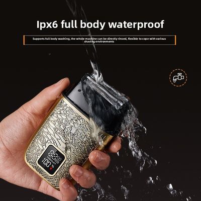 Un rasoir électrique professionnel pour homme avec une batterie de 500 mAh, des lames en acier inoxydable et un lavage complet du corps