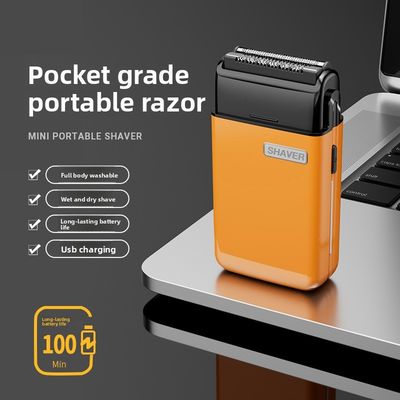Mini rasoir électrique portable avec 1,5 heure de charge Parties de rechange gratuites et boîtier en plastique pour hommes