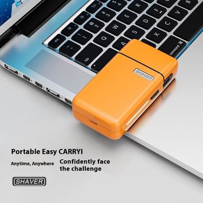 Mini rasoir électrique portable avec 1,5 heure de charge Parties de rechange gratuites et boîtier en plastique pour hommes