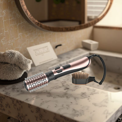 Une brosse à cheveux de 1200W avec 3 niveaux de température et une tension de 220 ~ 240V pour un coiffage facile
